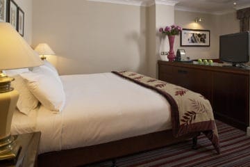 King size bed of Grand Room at The Rembrandt, London
